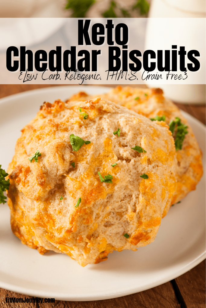 Super easy Keto Cheddar Biscuits that are fluffy and a copycat recipe to a popular restaurant chain.  Garlicy, butter, and delicious, these biscuits are the perfect simple side.