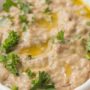 This Roasted Eggplant Dip is the easiest, tastiest, and most healthy appetizer you can make for any party! Naturally gluten free and low carb, you don't have to feel bad if you can't stop eating it.