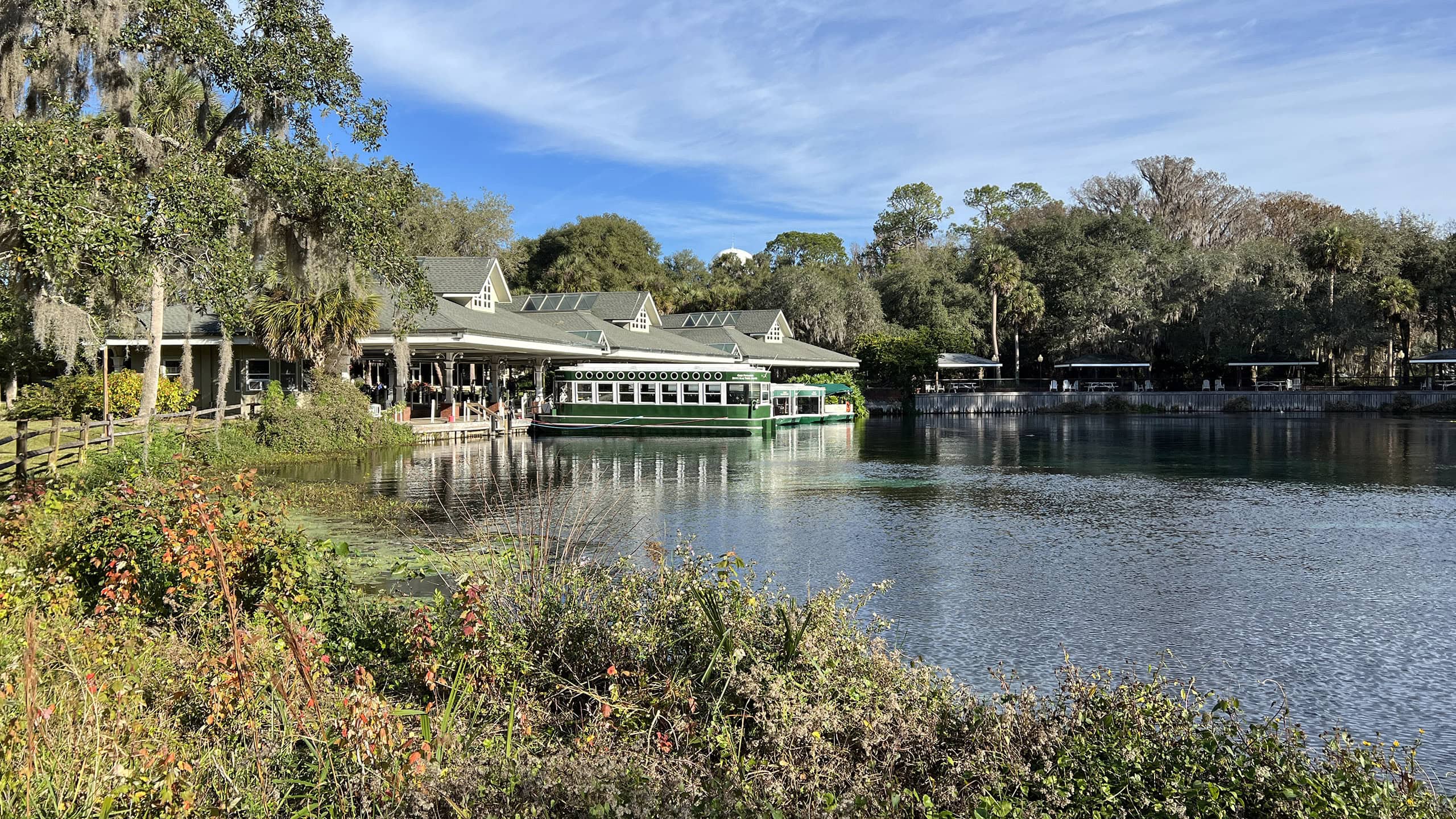 Glass bottom boats docked at a spring