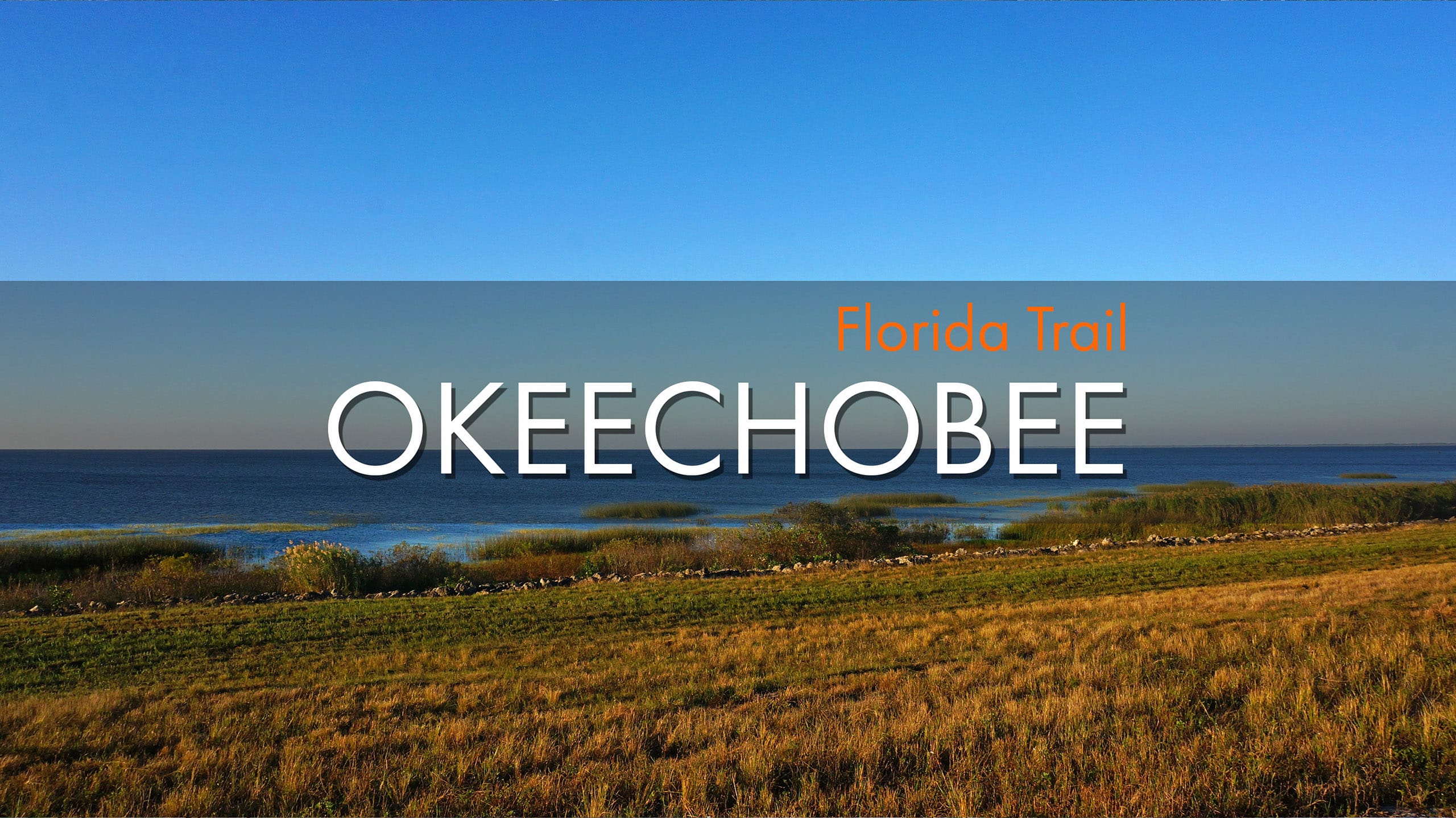 Words Florida Trail Okeechobee overlaid on horizon to horizon lake