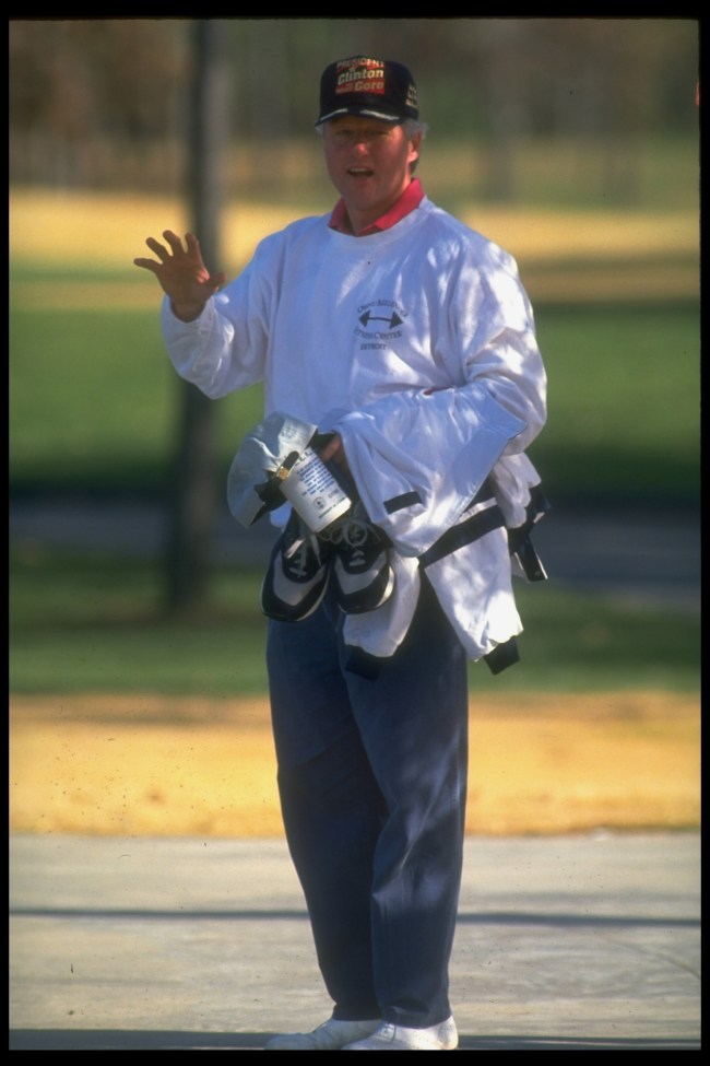 90s shoe and fashion trends, Former President Bill Clinton clad for golf, after game, carrying New Balance running shoes, ready for a post-golf jog. 