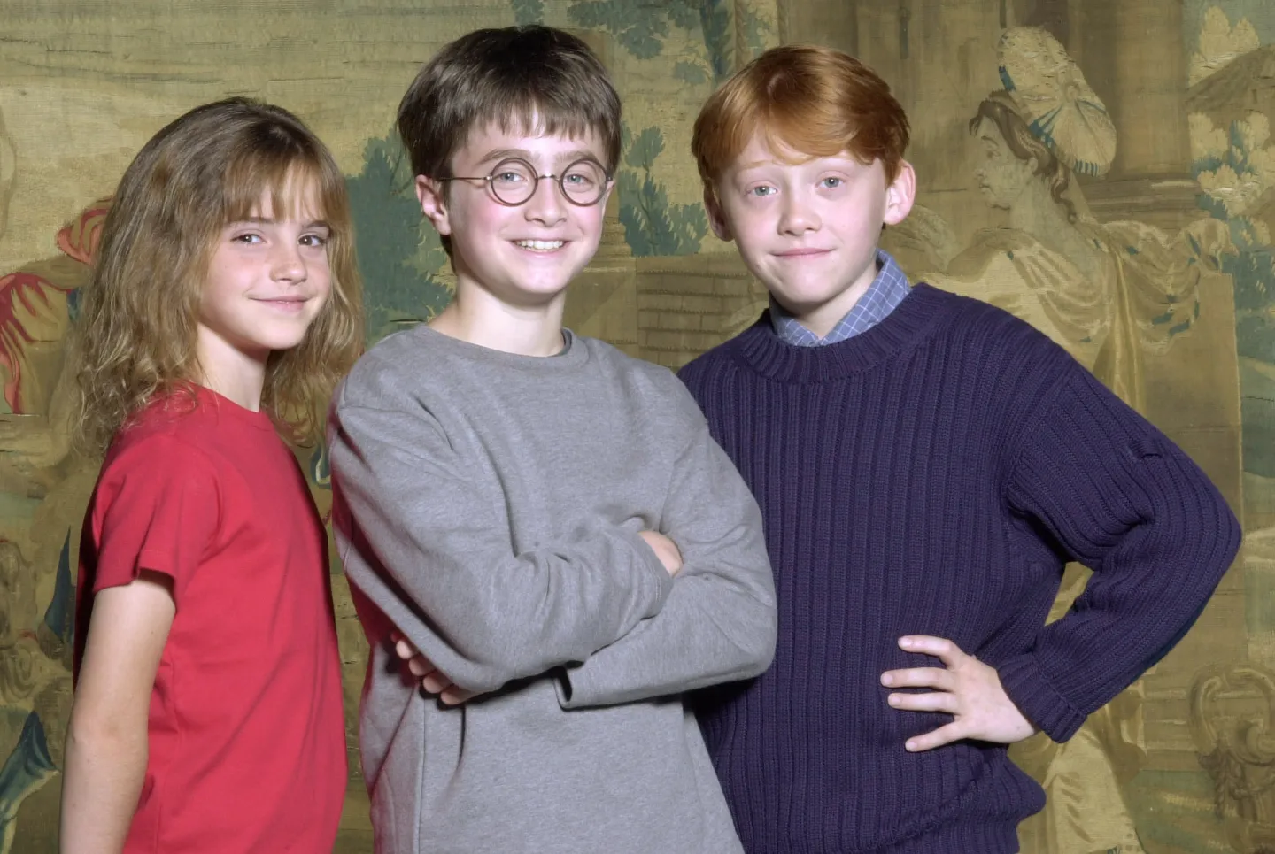 Warner Bros. Pictures announced August 21, 2000 that the young actor Daniel Radcliffe, center, has been named as the young actor who will play Harry Potter, in the upcoming film adaptation of the popular books by J.K. Rowling. Newcomers Rupert Grint, right, and Emma Watson will be taking on the roles of Ron and Hermione, Harry's best friends at Hogwarts.