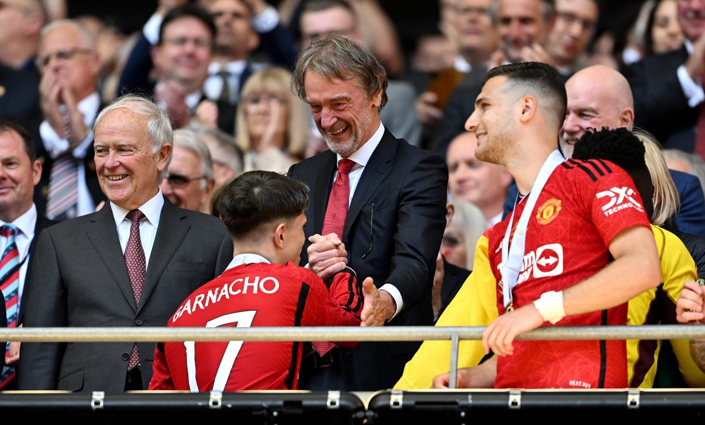 Sir Jim Ratcliffe, minority owner of Manchester United shakes hands with Alejandro Garnacho of Manchester United, after the Emirates FA Cup Final match between Manchester City and Manchester United at Wembley Stadium