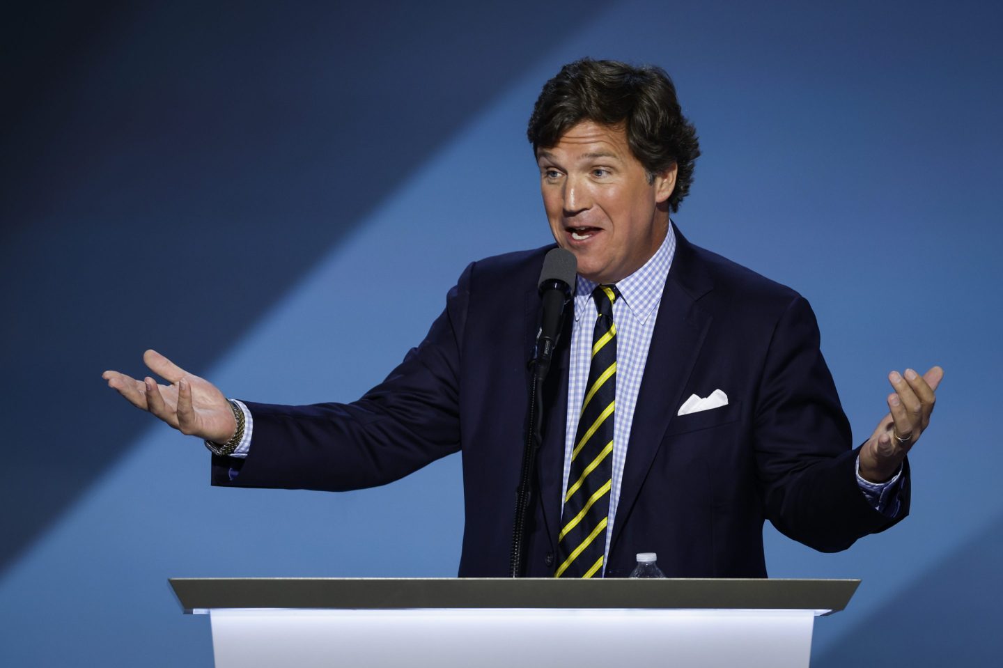 MILWAUKEE, WISCONSIN &#8211; JULY 18: Tucker Carlson, founder of Tucker Carlson Network, speaks on stage on the fourth day of the Republican National Convention at the Fiserv Forum on July 18, 2024 in Milwaukee, Wisconsin. Delegates, politicians, and the Republican faithful are in Milwaukee for the annual convention, concluding with former President Donald Trump accepting his party&#8217;s presidential nomination. The RNC takes place from July 15-18. (Photo by Chip Somodevilla/Getty Images)