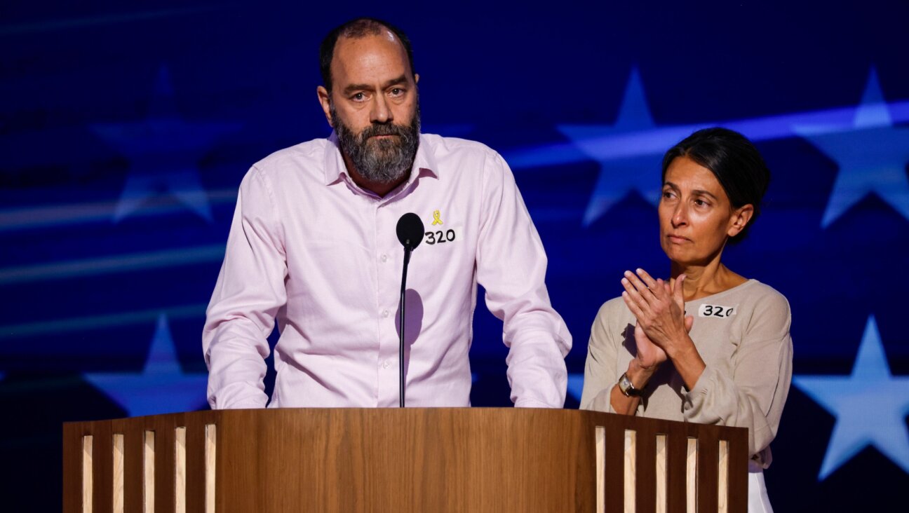 Jon Polin and Rachel Goldberg-Polin, parents of Hersh Goldberg-Polin, speak on stage during the third day of the Democratic National Convention Aug. 21 in Chicago.