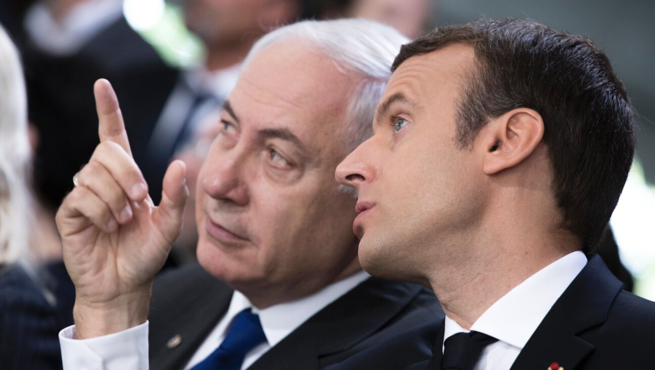 Benjamin Netanyahu and Emmanuel Macron. 2017.