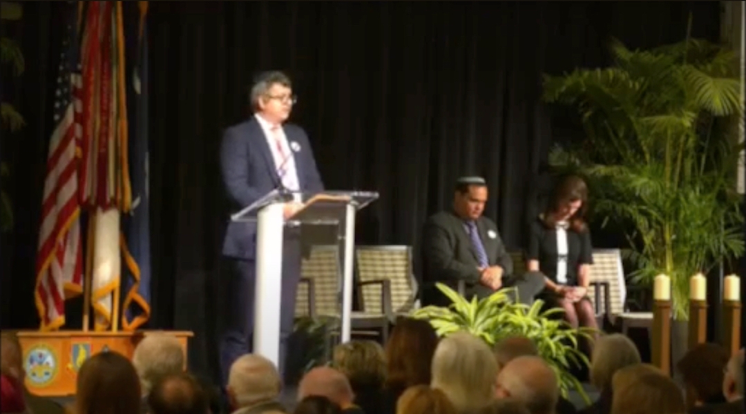 Rabbi Sam Rose criticizes US government policies during an event commemorating the 80th anniversary of the liberation of Auschwitz at the University of South Carolina, Jan. 27, 2025, in Columbia, South Carolina. Rose’s speech was later cut from the broadcast’s archive. (Screenshot via YouTube)