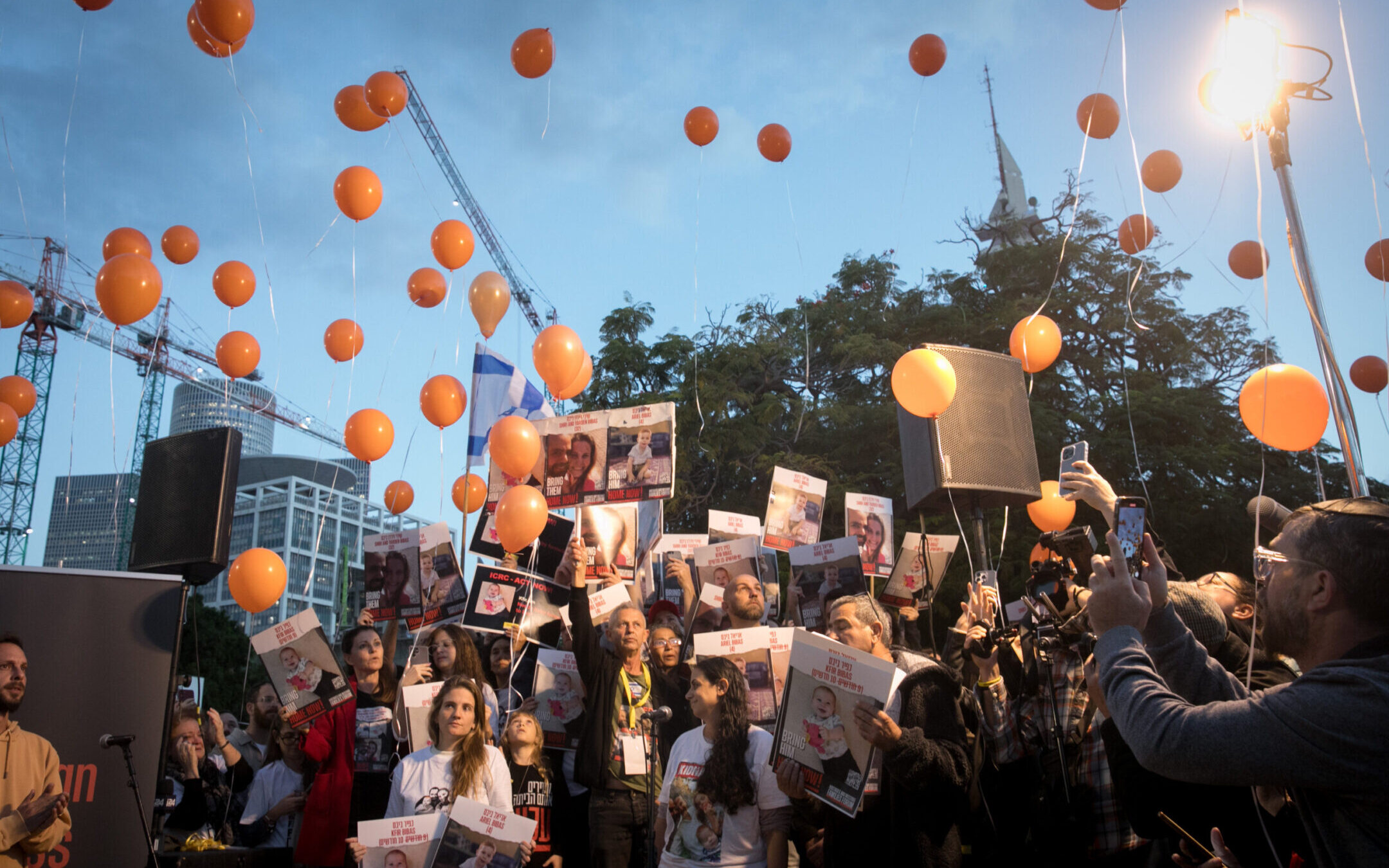 Orange balloons have become a symbol of the Bibas family because of the abducted children’s red hair. (Miriam Alster/Flash90)