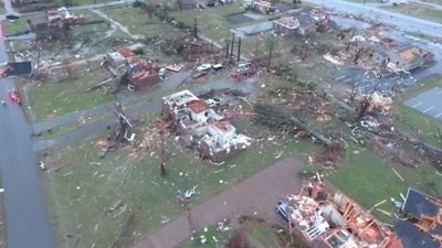 Image for story: 19 people are dead and numerous homes are damaged after a tornado tears through Tennessee