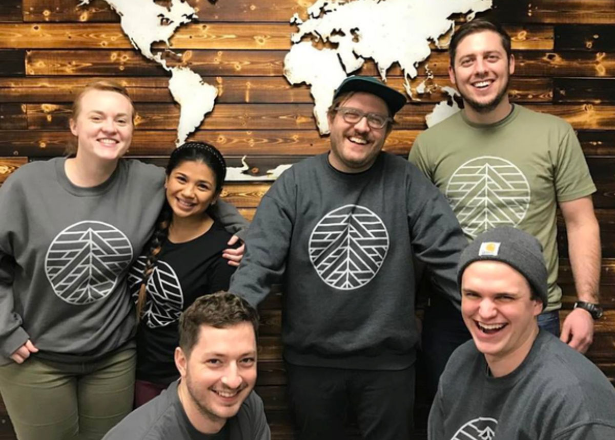 A group of people wearing custom shirts