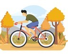 Boy Rides a Bicycle in Park