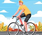 Man Cycling during the Autumn