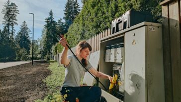 a man holding a drill