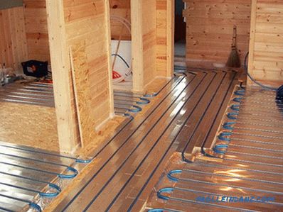 Warm floor under linoleum on a wooden floor