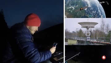 A person in a red hat uses a phone at night, with satellite imagery and a ground station displayed.