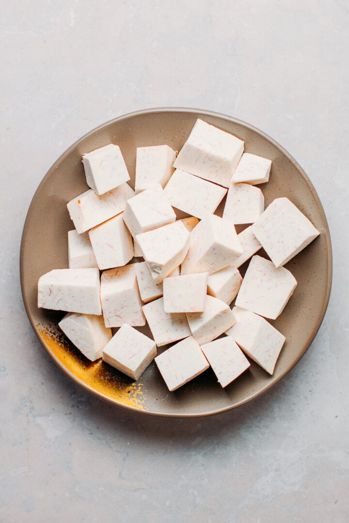 Diced taro on a plate.