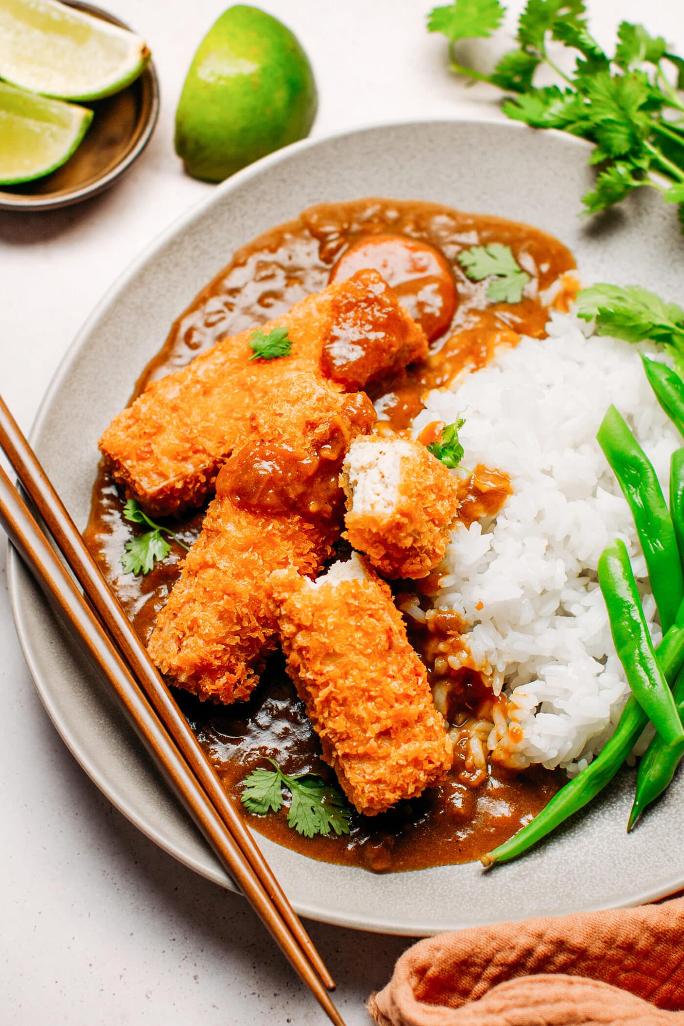 Panko tofu with curry sauce and white rice.