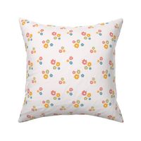 Micro pink, yellow, green and blue cute playful daisy flowers motif