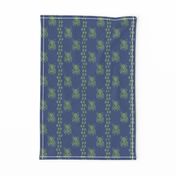 Bohemian block printed fly on the wall stripe in royal blue and celadon green for a perfect picnic.