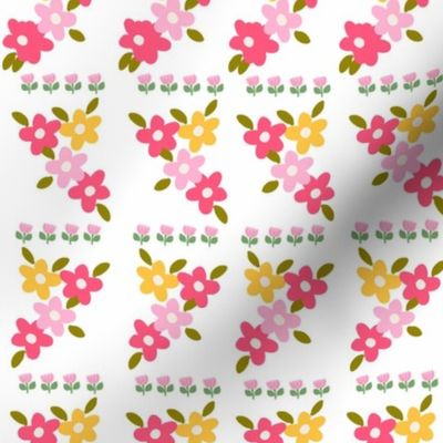 Cute ditsy Floral Border Print in Pinks and Yellow