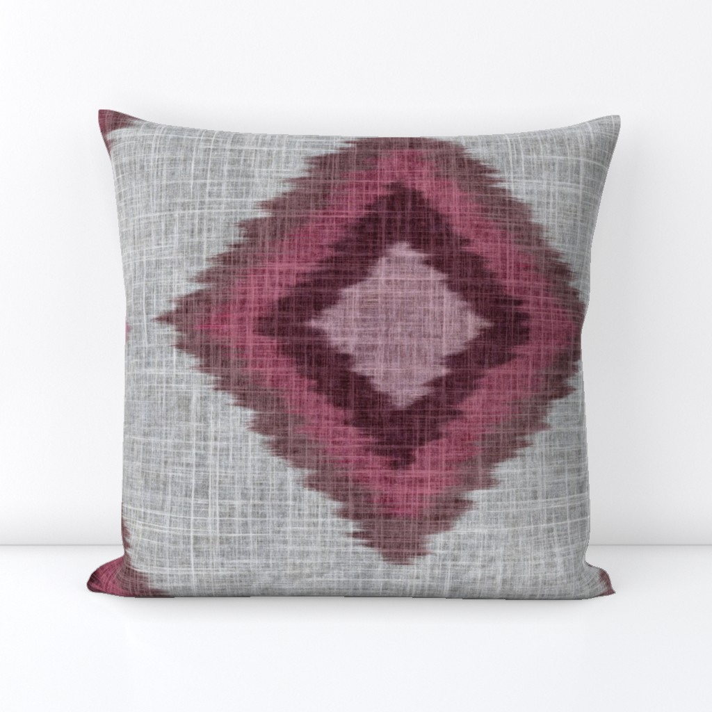 Large scale Ikat woven diamonds in raspberry pink with linen texture