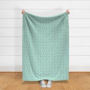 Small textured abstract retro beige and fresh green scallop florals on blue