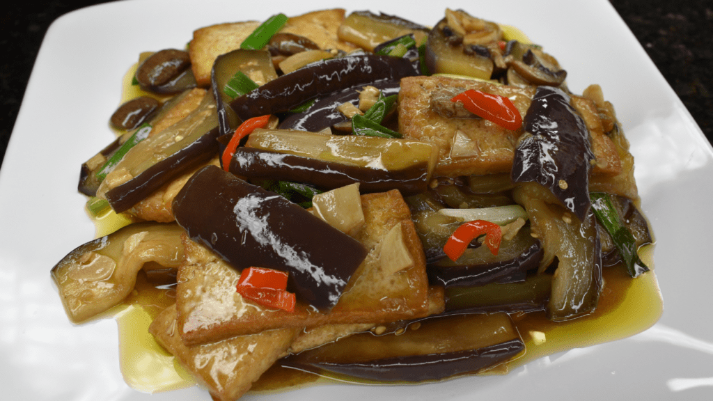 Eggplant Tofu Stir Fry is an easy vegan recipe that makes a nutritious and delicious meal in no time at all. Quick and easy to make.