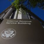 A shot of an IRS building looking up at it from a very low angle.