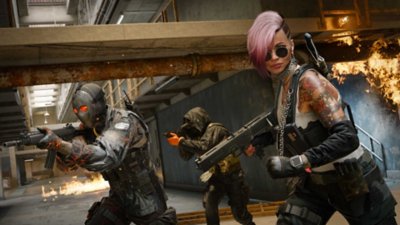 Call of Duty: Warzone screenshot three characters running through a prison block