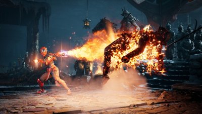 Mortal Kombat 1 screenshot showing Sektor engulfing Scorpion in flames