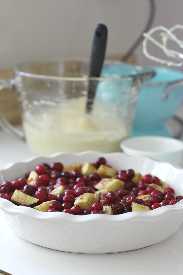 Easy to prepare, Cranberry Apple Cake is a little like cake and a little like pie. Full of autumn fruit, brown sugar and cinnamon, it is a perfect dessert.