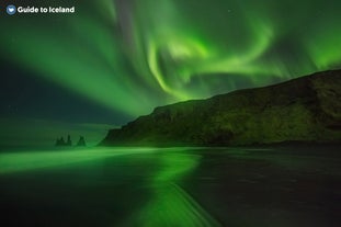 Northern lights by Reynisfjara black sand beach