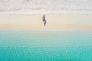 Sun bathing at Black Island in Coron Town, Palawan