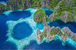 Twin Lagoon, where azure waters teeming with marine life create a mesmerizing experience