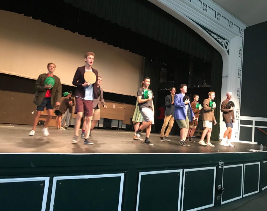 The cast rehearses a number called "Old Established."