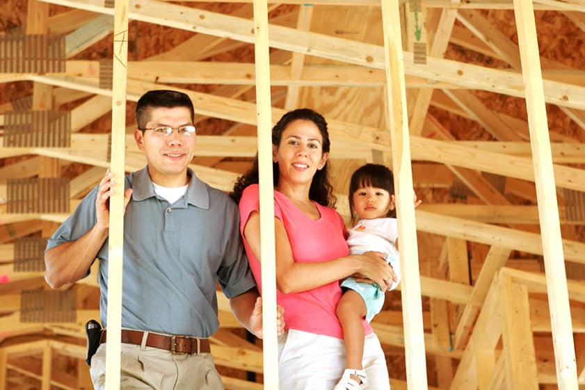 Family on build site