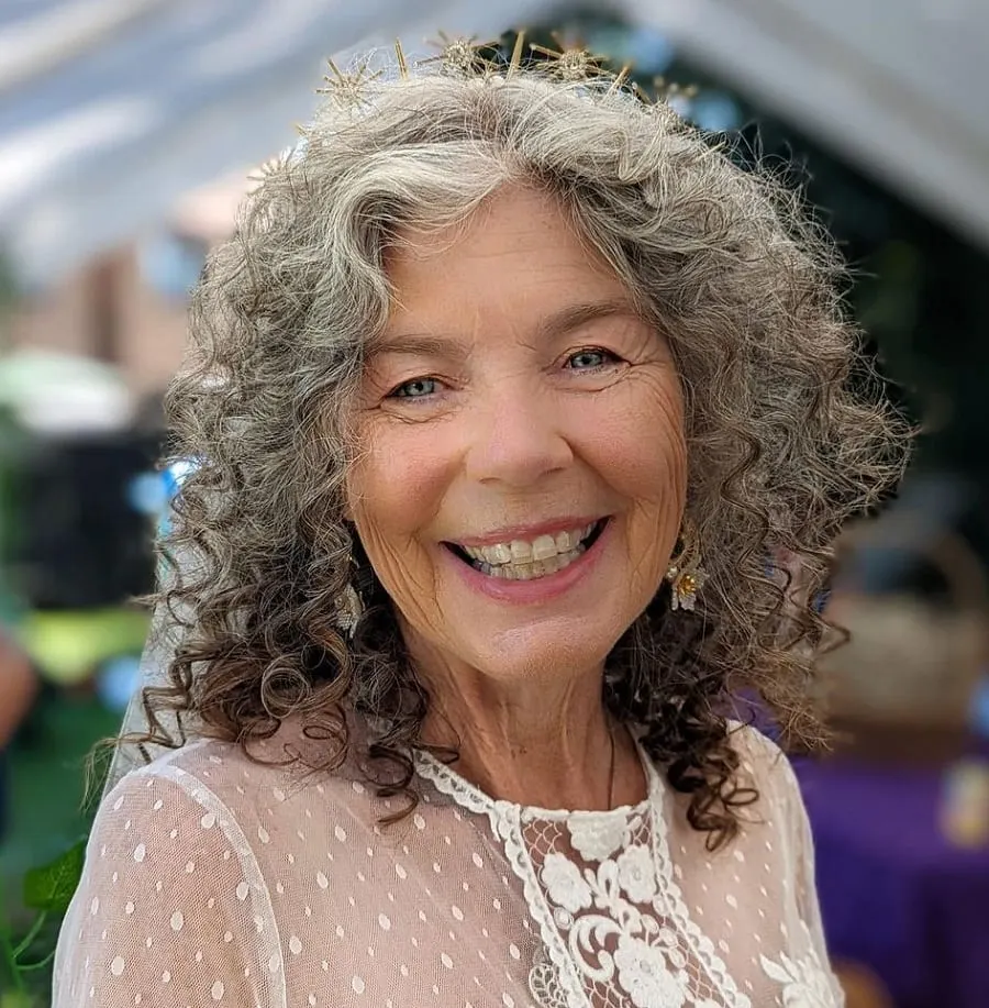 wedding hairstyle with curly grey hair