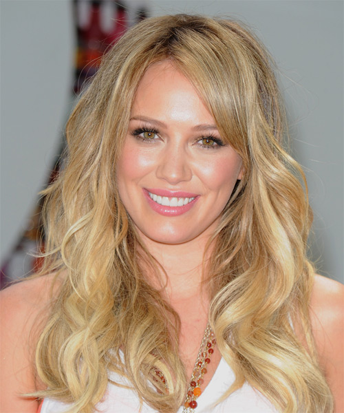 Hilary Duff Long Wavy    Champagne Blonde Shag  Hairstyle with Side Swept Bangs  and Light Blonde Highlights