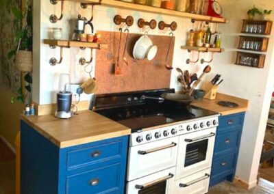 aged copper splashback in rustic kitchen