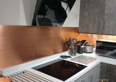 orange copper kitchen splashback with lacquer finish