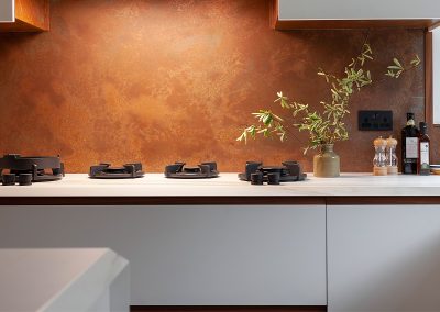 rustic copper kitchen splashback