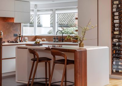 exposed wood and aged copper in white kitchen