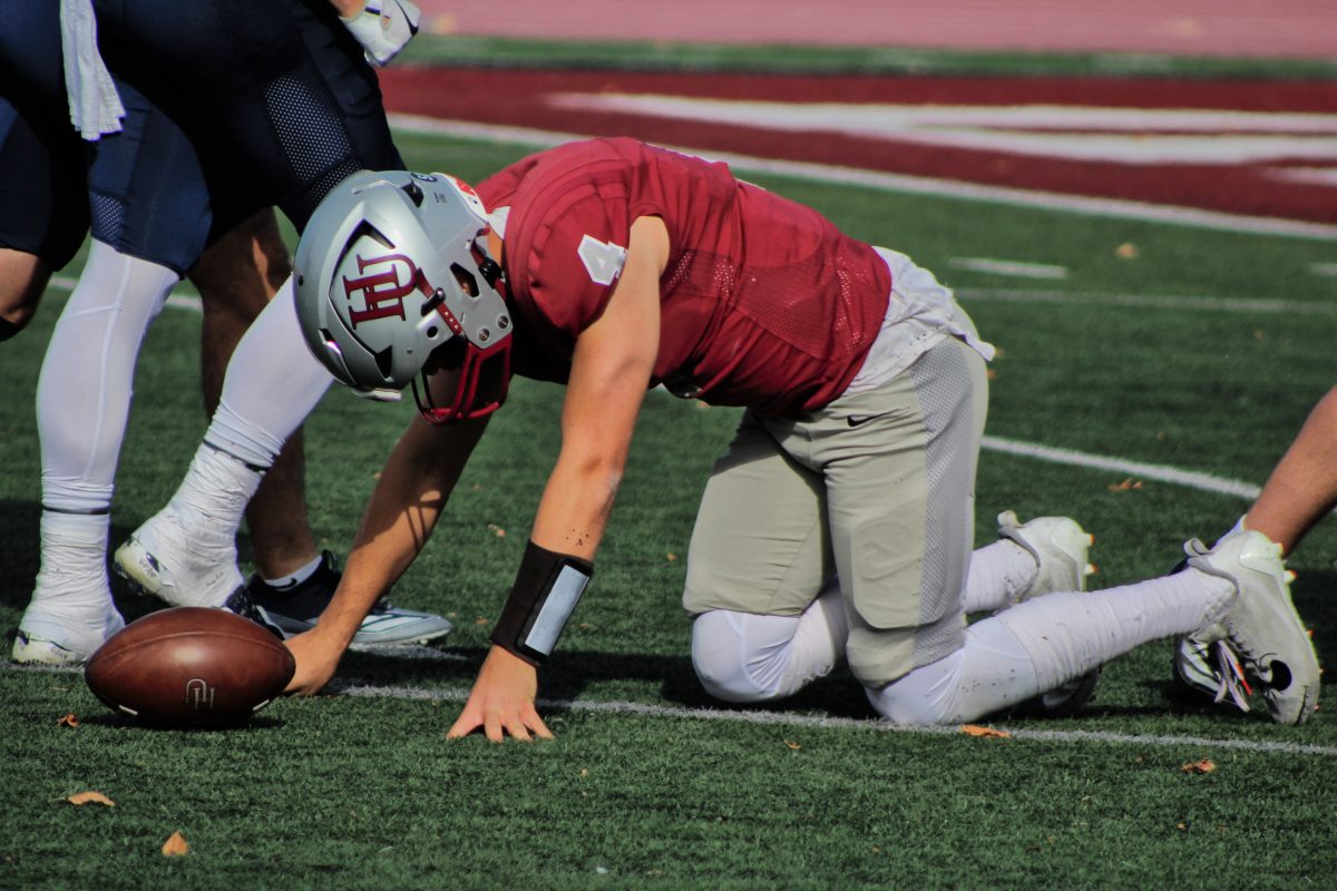 Senior quarterback Alejandro Villanueva gets back up after getting sacked by Bethel defenders during the second quarter.