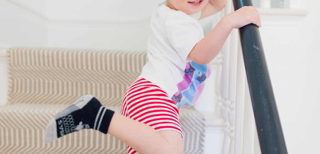 Major Martino stands on the stairs wearing his new big boy underwear as he starts the potty training process