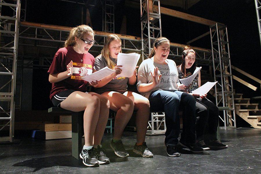 Juniors Taya Randle, Shelby Knoll, Emily Ricke and senior Jordyn Dake rehearse an energetic scene.