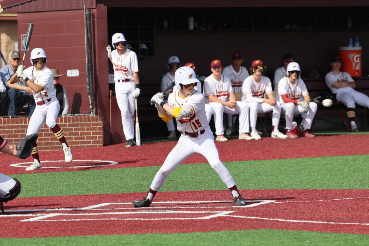 Indian baseball plays against Washburn Rural, Garden City