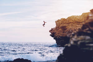 Hd Desktop Cliff Jumping Wallpaper