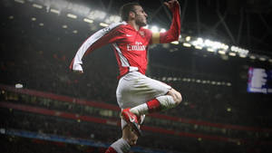 Iconic Midfield Maestro - Cesc Fabregas In His Prime At Arsenal Fc. Wallpaper