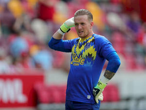 Jordan Pickford Posing In Blue Jersey Wallpaper