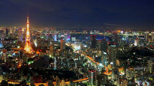 Photo Stunning Nighttime Lights Illuminate Tokyo City Wallpaper